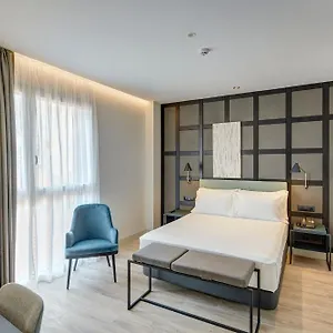 Sercotel Ayala Отель